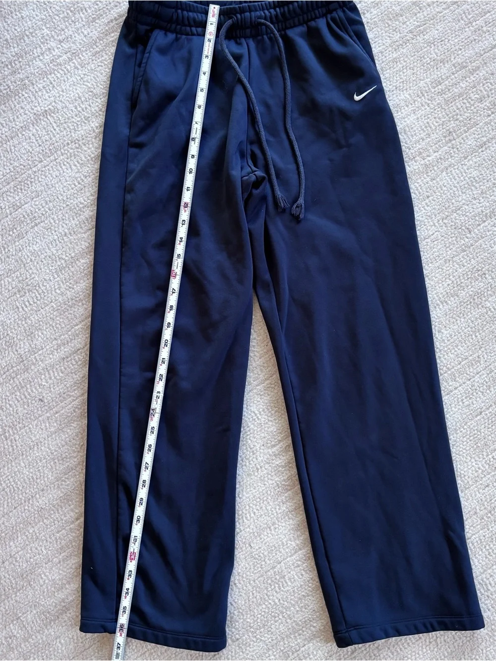 Nike Women’s Black sweatpants with White Swoosh